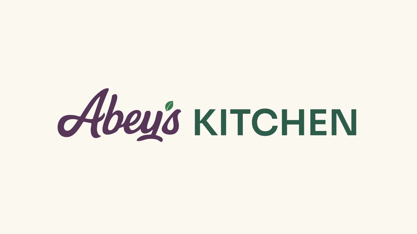 Final Abey's Kitchen logo with aubergine script wordmark, evergreen descriptor and leaf accent on an ivory background